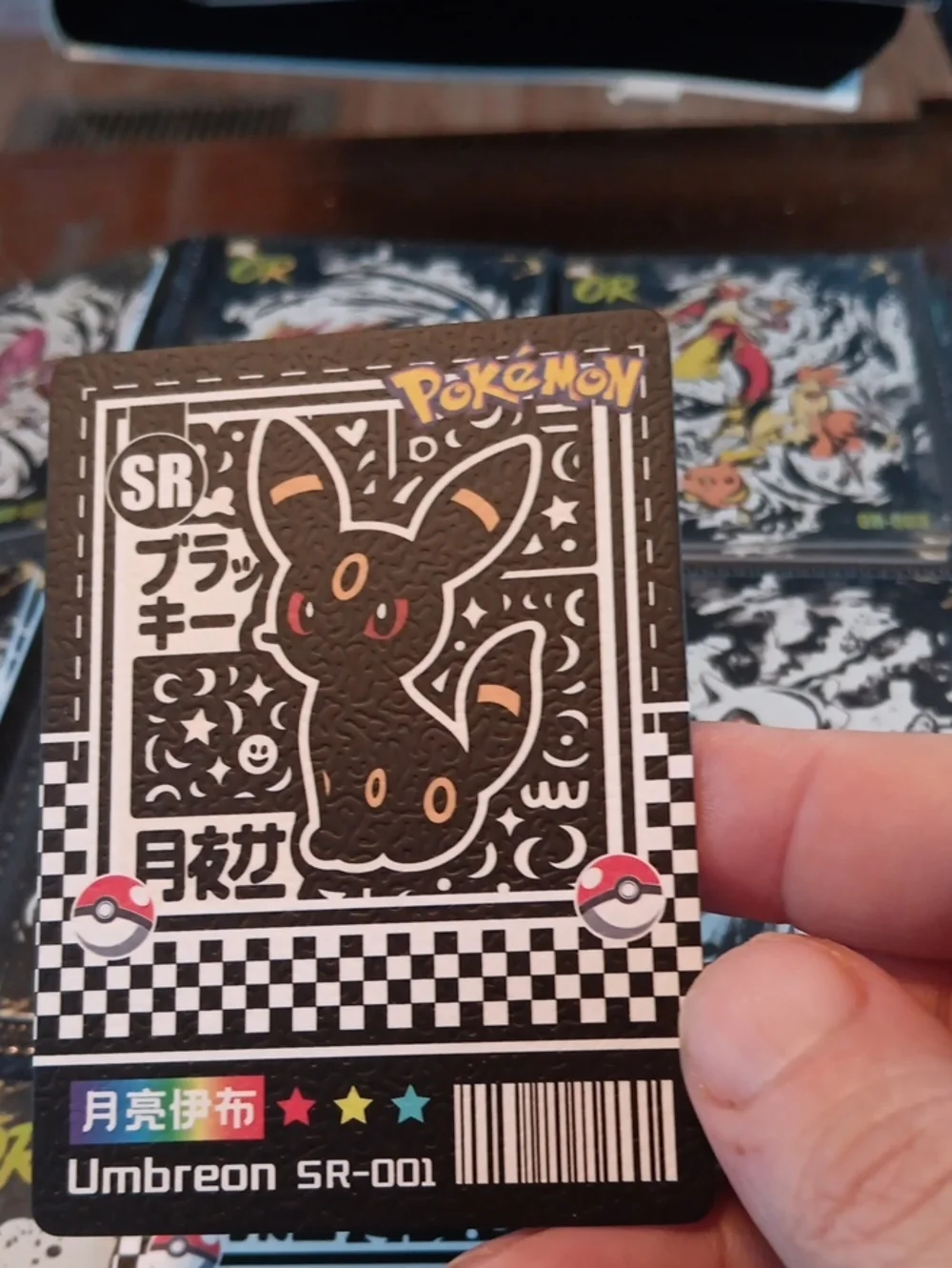 Pokemon Umbreon Trading Card — Black, White, Red, Yellow